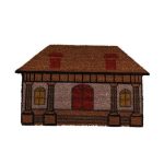 felpudo de coco con forma de casa